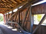 Rice Covered Bridge on the NRHP since August 25, 1980. South of Landisburg on Legislative Route 50023 (Kennedy Valley Rd., just south of Water Street) in Tyrone Township, Perry County, Pennsylvania. According to the NRHP nomination - Rice Bridge has a unique combination of Burr Arch-Queen Post construction (shown here), was built in 1869, and is 123 feet in length.