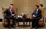 Chinese President Hu Jintao, right, talks with Australia's main opposition Labor Party leader Kevin Rudd in Sydney Friday, Sept. 7, 2007, ahead of the Asia Pacific Economic Cooperation (APEC) leaders' summit.