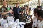 on friday 27 july, in Citrana, Oecusse, a medical mission was led and coordintaed by MLG ( seen here is CMLO Cl Dransfield left) together with 2 FFDTL officers, Timorese doctord and cuban doctors as well as a UN nurse and responsible local athorities. The team saw 618 patients in a day and delivered medicine after consultations, did malaria tests and other vaccines when needed provided by the Timor-Leste Ministry of health. Seen here is a patient.Photo by UNMIT/Martine Perret. 27 Juy 2012