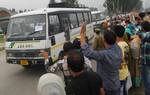 Kashmiri muslims say goodbye to Kashmiri pilgrims departing for Mecca for the annual Hajj pilgrimage in Srinagar on September 17, 2012. The first batch of 279 Kashmiri Hajj pilgrims set off for the annual trip. Some 34,000 Hajj travel applications were received for this year's pilgrimage season, with 8700 pilgrims selected for the journey.