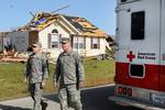 U.S. Army Spc. William Clark, left, and Sgt. Mark Boggs, both with Charlie Battery, 2nd Battalion, 138th Fires Brigade, patrol a neighborhood in Hodgenville, Ky., March 1, 2012. Homes were damaged Feb. 29, 2012, when an EF-4 tornado repeatedly touched down in the Hodgenville area. (U.S. Army photo by Sgt. Scott Raper/Released)