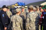 Kentucky Army National Guardsmen with Charlie Battery, 2nd Battalion, 138th Fires Brigade support LaRue County, Ky., authorities March 2, 2012, after an EF-4 tornado repeatedly touched down in the area Feb. 29, 2012. (U.S. Army photo by Staff Sgt. Steve Tressler/Released)