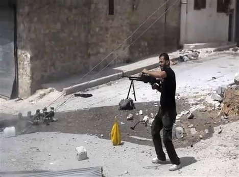 In this image made from video and accessed Saturday, Sept. 1, 2012, a Syrian rebel fires his weapon at Syrian Army positions during fighting in Aleppo, Syria.