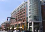 A view of the Georgia Tech Hotel and Conference Center's exterior, as seen from the corner of 5th Street and Spring Street