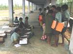 Around 30 students of the Sokhisole Sishu Sikhs Kendra became habituated in learning under the tree or in the vacant Lalgarh bus stand passengers' shed as the SSK don't have any school building since it started to work in 2009 after approval. Two teachers of the SSK manage to distribute books & mid-day meal at the places beneath the tree or in the bus stand passengers' shed where and when the students learn in Eastern India