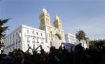 Protestors shout slogans against former Tunisian President Zine El Abidine Ben Ali in the center of Tunis, Monday, Jan. 17. 2011.