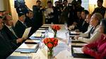 U.S. Secretary of State Hillary Rodham Clinton, second right, meets with Myanmar's President Thein Sein, second left, in New York Wednesday, Sept. 26, 2012. Clinton said Wednesday the U.S. will ease its import ban on Myanmar that had been a key plank of remaining American economic sanctions.