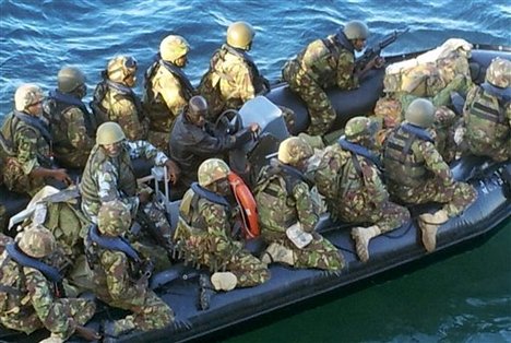 This undated photo provided by Kenya's Ministry for Defence on Friday, Sept. 28, 2012, is said by them to show Kenya Defence Forces troops at an undisclosed location in Kenya, engaged in recent preparations for an assault on the Somali port city of Kismayo.