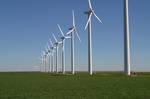 Wind farm in the plains of West Texas. The Great Plains contribute substantially to wind power in the United States. In July 2008, oilman turned wind-farm developer, T. Boone Pickens, called for the U.S. to invest $1 trillion to build an additional 200,000 MW of wind power nameplate capacity in the Plains, as part of his Pickens Plan.