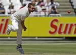 Australia's Shane Watson bowls during a cricket test match against South Africa in Cape Town, South Africa, Friday, Nov. 11, 2011.