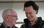 British film director, Terence Davies, left, and British actor Tom Hiddleston, converse during the photo call to promote the film ' The Deep Blue Sea ' at 59th San Sebastian Film Festival Cinema in San Sebastian northern Spain, Monday Sept. 19, 2011. (AP Photo/Alvaro Barrientos)