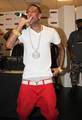 Soulja Boy performs during the Macy's mstylelab concert tour at Macy's in the Broward Mall August 13, 2011