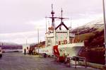 Kodiak, AK (Nov. 20)--Coast Guard cutter Alex Haley (WMEC 39) slides up nexts to its new moorings Saturday morning at Coast Guard Integrated Support Command Kodiak. The cutter is named after Alex Haley, famous author and the first Chief Journalist in the Coast Guard. Haley enlisted in the Coast Guard in 1939 as a mess attendant (steward). During his years of service he developed and honed his writing skills. After his writing talents were discovered in 1952, the Coast Guard created the Journalis