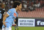 Napoli's Uruguayan striker Edinson Cavani celebrates after scoring a goal during an Italian Serie A soccer match between Napoli and Lazio at Naples' San Paolo stadium, Italy, Wednesday, Sept. 26, 2012.