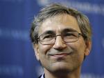 Turkish novelist Orhan Pamuk appears at a news conference in New York, Thursday, Oct. 12, 2006. Pamuk, an international symbol of literary and social conscience, whose poetic, melancholy journeys into the soul of his native Turkey have brought him the ma