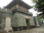 Quanzhou's restored Quanshan Gate, flanked by two stale-carrying turtles. A massacre of the Portuguese at Quanzhou resulted in the Portuguese settlement of Macau.