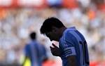 Argentina's Lionel Messi gestures during a World Cup 2014 qualifying soccer game against Bolivia in Buenos Aires, Argentina, Friday, Nov. 11, 2011.