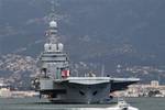 France's nuclear-powered aircraft carrier Charles de Gaulle leaves its home port of Toulon, southern France, Sunday, March 20, to the Mediterranean sea. Top officials from the United States, Europe and the Arab world have launched immediate military action to protect civilians as Libyan leader Moammar Gadhafi's forces attacked the heart of the country's rebel uprising .