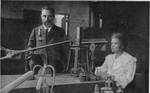 Pierre and Marie Curie in their Paris laboratory, before 1907. It soon became clear that the blackening of the plate had nothing to do with phosphorescence, because the plate blackened when the mineral was in the dark.