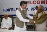 Jammu and kashmir Chief Minister Omar Abdullah shake hands with UPA Presidential candidate Pranab Mukherjee soon after his arrival for campaigning in jammu and kashmir union minister for new and renewable energy Farooq Abdullah is also present at Skicc on the banks of Dal Lake in Srinagar on 15, July 2012. Mukherjee is on a visit to jammu kashmir in order to garner support for the Presidential election shedule to be held on July 19.