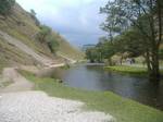 The River Dove at Dovedale. From Hartington to its confluence with the River Manifold at Ilam, the river flows through a series of scenic limestone valleys, known collectively as Dovedale.