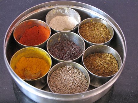 special spices box used in Indian food having Red chili powder, Turmeric, Garam masala, Cumin powder, Cumin seeds, Black mustard seeds