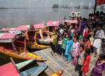 Kashmiri migrant students, who were born and brought up in jammu and other parts of the country, curiosity looking on world Famous Dal Lake in Srinagar on Tuesday 04, September 2012. The students who are on their maiden visit to kashmir After their parents migrated to other parts of the country in the wake of eruption of militancy in kashmir 1989. The tour named as Kashmir darshan.