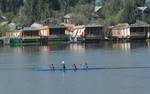 Kashmiri boys practice kayaking on the waters of Dal Lake in Srinagar, India, on 03, September 2012.