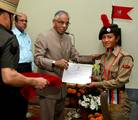 West Bengal Governor Shri MK Narayanan awards a merit certificate to Cdt Wangmu Bhutia of 4 Bengal Bn (Girls) NCC, Darjeeling at Rajbhavan on Tuesday in Eastern India City