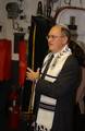 Rabbi Michael A. Oppenheimer carries a 300-year-old Torah