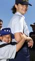 JONES BEACH, New York (July 12)--Darrell Daley, 8, from Belport, NY, latches onto Seaman Karen L. Blumenthal from Station Jones Beach July 12. 