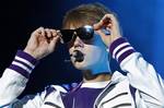 Singer Justin Bieber performs during his My World Tour concert at the National Stadium in Lima, Peru, Monday, Oct. 17, 2011. (AP Photo/Enrique Castro Mendivil, Pool)