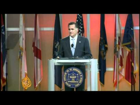 Republican candidate Mitt Romney booed at civil rights group meeting