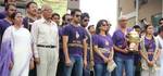 Chief Minister of West Bengal, Mamata Banerjee, West Bengal Governor M.K Narayan along KKR Captain Gautom Ghambir and actress Juhi Chawla during the IPL Twenty20 champion's trophy during celebrations in front of the Writers Building in Kolkata on May 29, 2012