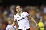 Valencia's Roberto Soldado celebrates after scoring against Deportivo la Coruna during a Spanish La Liga soccer match at the Mestalla stadium in Valencia, Spain, Sunday, Aug. 26, 2012.