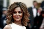 Singer Cheryl Cole arrives for the screening of 