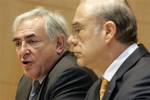 The head of the International Monetary Fund Dominique Strauss-Kahn, left, and OECD Secretary General Angel Gurria during a press conference on structural reforms in Europe organized by the Organization for Economic Cooperation and Development, in Paris, Monday March 17, 2008. Strauss-Kahn said the world financial crisis is more serious and more global than a few weeks