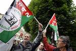 Pro-Palestinian supporters demonstrate in front of the OECD (Organization for Economic Cooperation and Development), in Paris, Monday, May, 10, 2010.