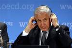 Israeli Prime Minister Benjamin Netanyahu, is seen at the OECD, the Organisation for Economic Co-operation and Development, during to Press meeting Thursday May 27, 2010, in Paris. Netanyahu is in Paris for a ceremony welcoming Israel into the Organization for Economic Cooperation and Development, a group of leading world economies.