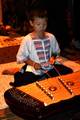 A Thai boy plays the khim, a traditional Thai instrument similar to the yangqin from China.*Khim audio