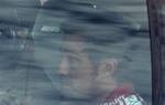 Ferrari driver Fernando Alonso of Spain is seen in the medical car after crashing during the Belgium Formula One Grand Prix in Spa-Francorchamps circuit , Belgium