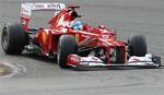 Ferrari driver Fernando Alonso of Spain steers his car, during the qualifying session, ahead of Sunday's Belgian Formula One Grand Prix in Spa-Francorchamps, Belgium