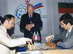 Classical World Champion Vladimir Kramnik, right, and World Chess Champion Veselin Topalov, left, resume the match in Elista, capital of Kalmykia, southern Russia, Monday, Oct. 2, 2006. Russia´s Vladimir Kramnik accepted the World Chess Federation