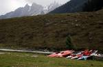 Kayaks are lined up on the bank of a stream before the start of a kayaking and canoeing championship on September 29, 2012 in Sonamarg, Kashmir, India. For the first time in the valley of Kashmir the three-day Indian National White Water Slalom Kayaking and Canoeing Championship began today at the hilly resort of Sonamarg. The Kashmir government has been focusing on adventure tourism, particularly since the mass uprising in 2010. The government is hoping the initiative will help bring peace to t