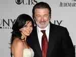 FILE - In this June 12, 2011 file photo, Alec Baldwin, right, and Hilaria Thomas arrive at the 65th annual Tony Awards in New York. Baldwin proposed to Thomas over the weekend.