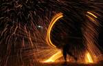 A Palestinian boys play with fire crackers as they celebrate the beginning of Ramadan, a holy month of dawn-to-dusk fasting, festivities and abstinence in Rafah, southern Gaza Strip on July 18, 2012. The Muslim holy month of Ramadan begins Friday 20 July or Saturday 21 July, is traditionally determined by the sighting of a new crescent moon, often dividing rival Islamic countries and sects over the exact date.Photo by Ahmed Deeb / WN