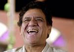 Bollywood actor Om Puri laughs after being felicitated at a function to mark the 57th anniversary of Indias Independence in Bombay, India, Sunday, Aug.15, 2004. Puri was awarded Order of the British Empire by Queen Elizabeth II for his outstanding servic