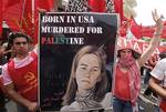 File - Lebanese anti-American protesters display a poster of peace activist Rachel Corrie during a demonstration near the U.S. Embassy in Aukar northeast of Beirut, Lebanon, Sunday,June 6, 2010, as they protested against Israel's deadly commando raid on the aid ships heading to Gaza which took place Monday.