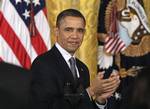 President Barack Obama applauds in the East Room of the White House in Washington, Tuesday, Feb. 15, 2011, during a 2010 Presidential Medal of Freedom ceremony.