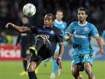 FC Porto's Alvaro Pereira, left, fights for the ball with Zenit's Danny during the UEFA Champions League, group G, soccer match, between Porto and Zenit St. Petersburg in St.Petersburg, Russia, Wednesday, Sept. 28, 2011.